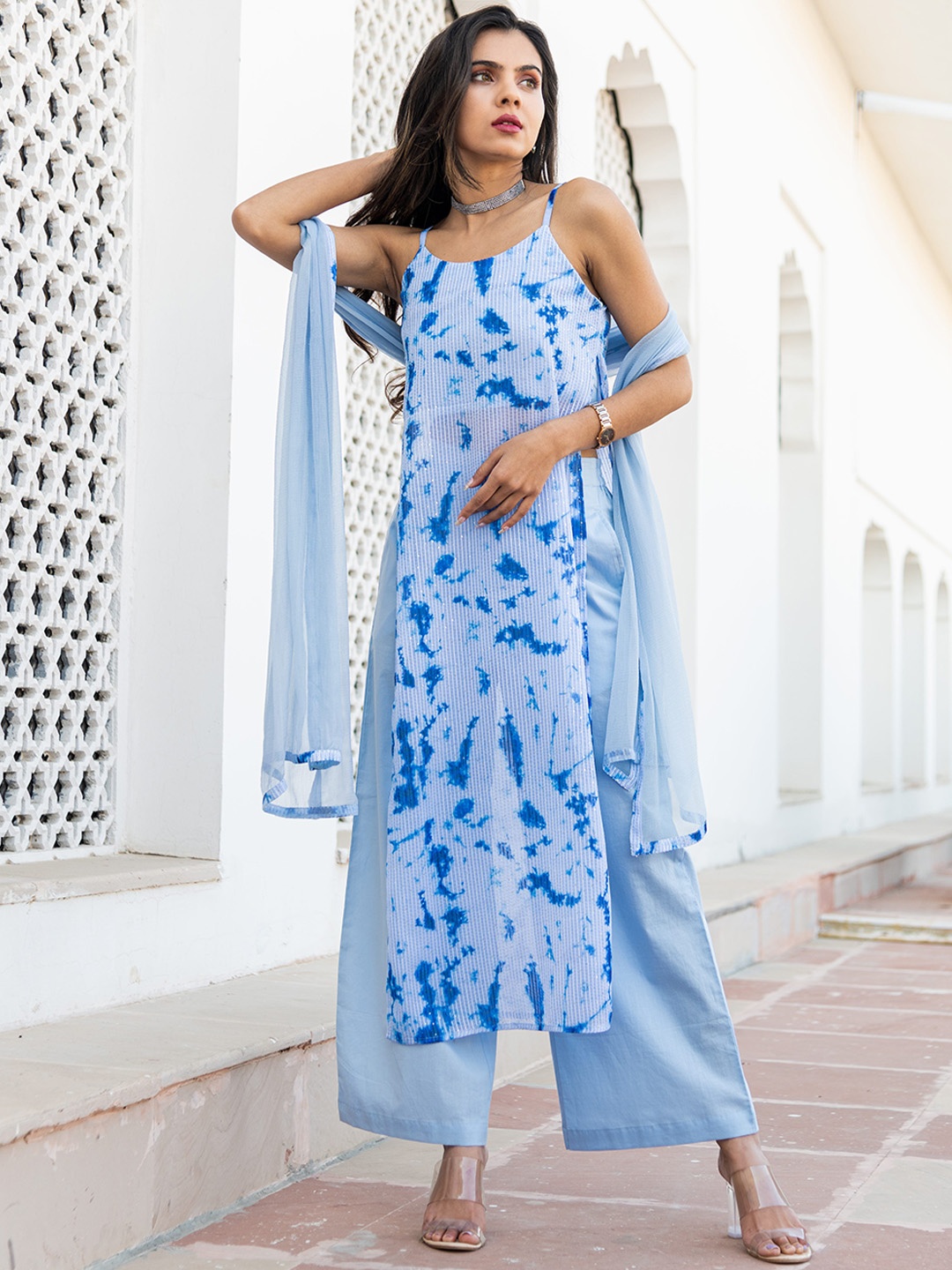 Kohsh High Slit Shoulder Strap Tie & Dye Sequinned Kurta with Palazzos & Dupatta, Blue
Kohsh High Slit Shoulder Strap Tie & Dye Sequinned Kurta with Palazzos & Dupatta, Blue