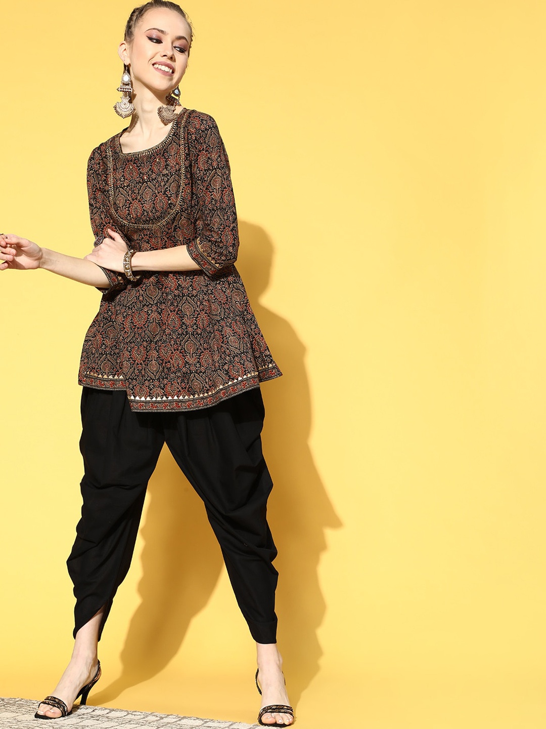 indo street Ethnic Motif Printed Thread Work Pure Cotton Empire Kurti With Dhoti Pants, Black
indo street Ethnic Motif Printed Thread Work Pure Cotton Empire Kurti With Dhoti Pants, Black