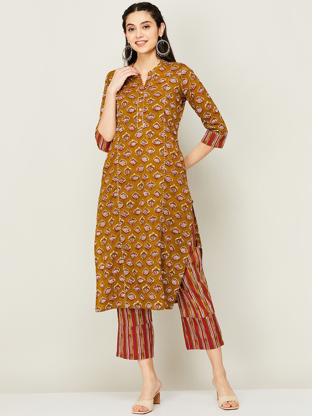 Melange by Lifestyle Floral Printed Gotta Patti Pure Cotton Kurta with Trousers, Mustard
Melange by Lifestyle Floral Printed Gotta Patti Pure Cotton Kurta with Trousers, Mustard
