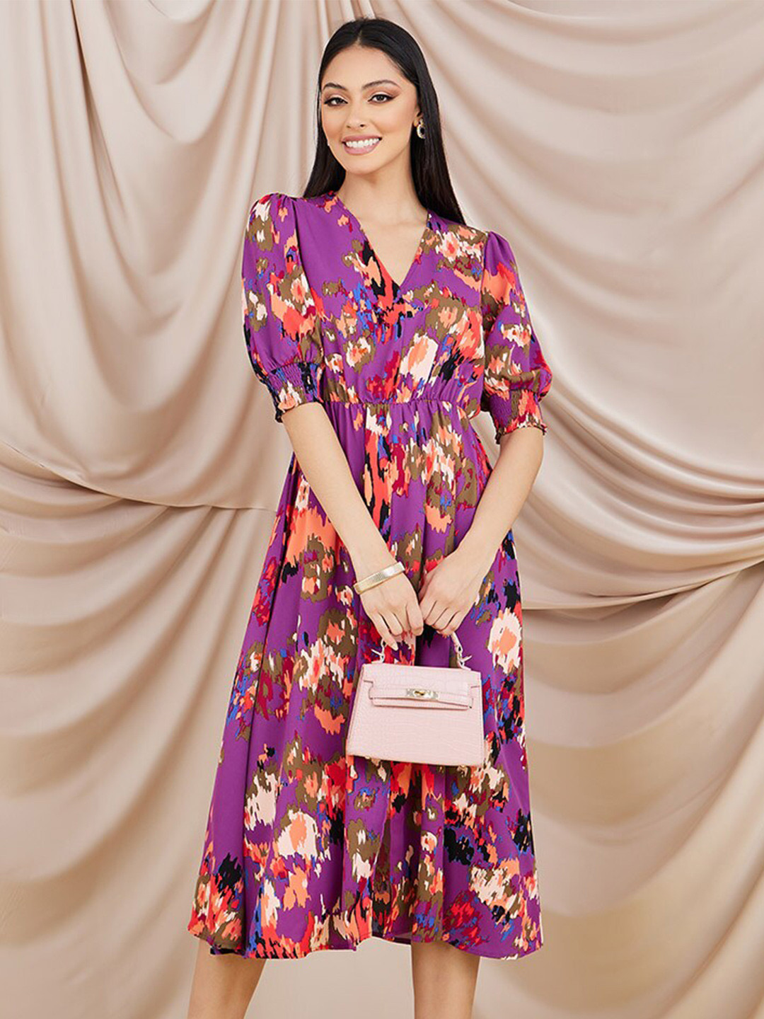 Styli Purple Printed V-Neck Puff Sleeves Midi Dress 
Styli Purple Printed V-Neck Puff Sleeves Midi Dress