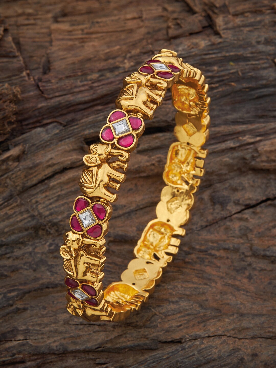 Kushal's Fashion Jewellery Gold-Plated Stone-Studded Elephant Detailed Silver Bangle, Red
Kushal's Fashion Jewellery Gold-Plated Stone-Studded Elephant Detailed Silver Bangle, Red