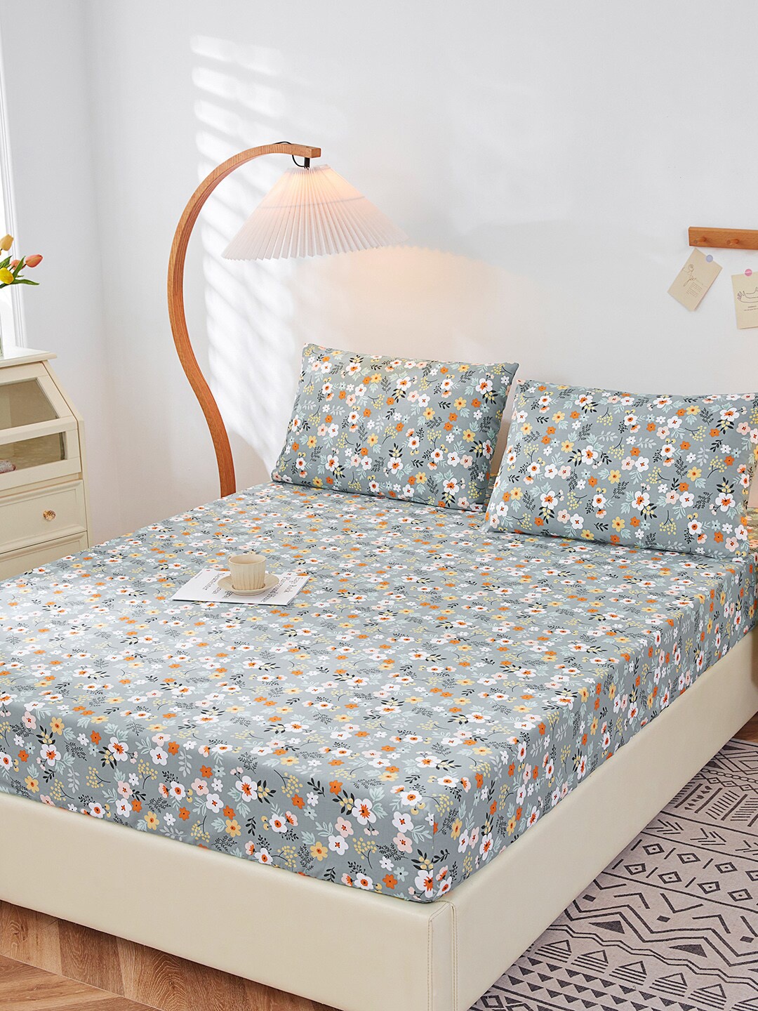 JC Collection Grey & Orange Floral Printed 200 TC Fitted Queen Bedsheet & Pillow Covers
JC Collection Grey & Orange Floral Printed 200 TC Fitted Queen Bedsheet & Pillow Covers
