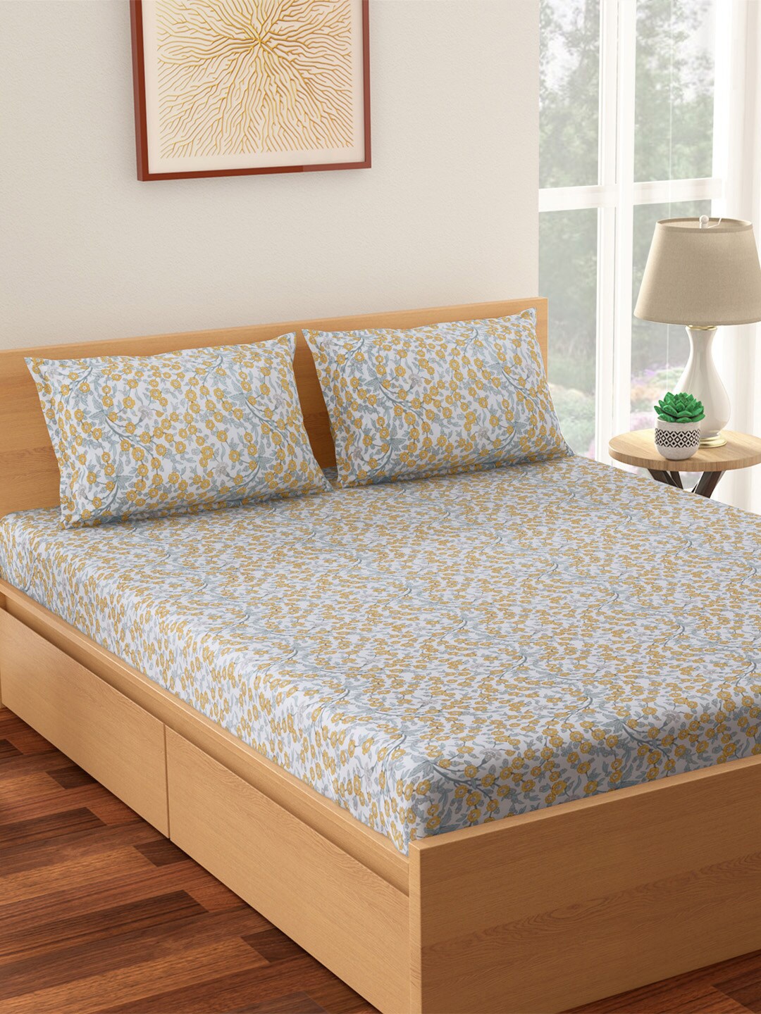 Living scapes by Pantaloons Grey & Yellow Floral 144 TC Queen Bedsheet & 2 Pillow Covers
Living scapes by Pantaloons Grey & Yellow Floral 144 TC Queen Bedsheet & 2 Pillow Covers