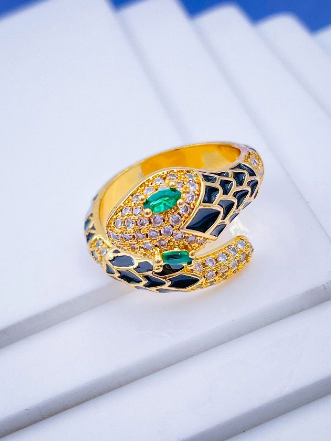 ZIVOM Gold-Plated Cubic Zirconia-Studded Snake Shaped Enameled Copper Finger Ring, Black
ZIVOM Gold-Plated Cubic Zirconia-Studded Snake Shaped Enameled Copper Finger Ring, Black