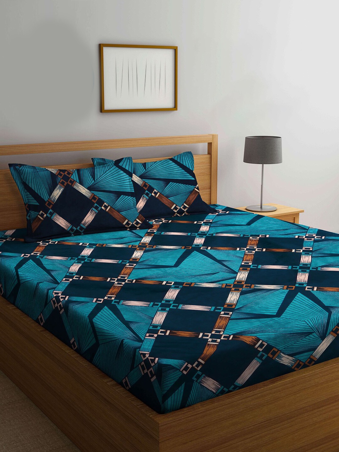 Arrabi Bookfold Navy Blue & Teal Geometric Printed 300 TC King Bedsheet & 2 Pillow Covers
Arrabi Bookfold Navy Blue & Teal Geometric Printed 300 TC King Bedsheet & 2 Pillow Covers