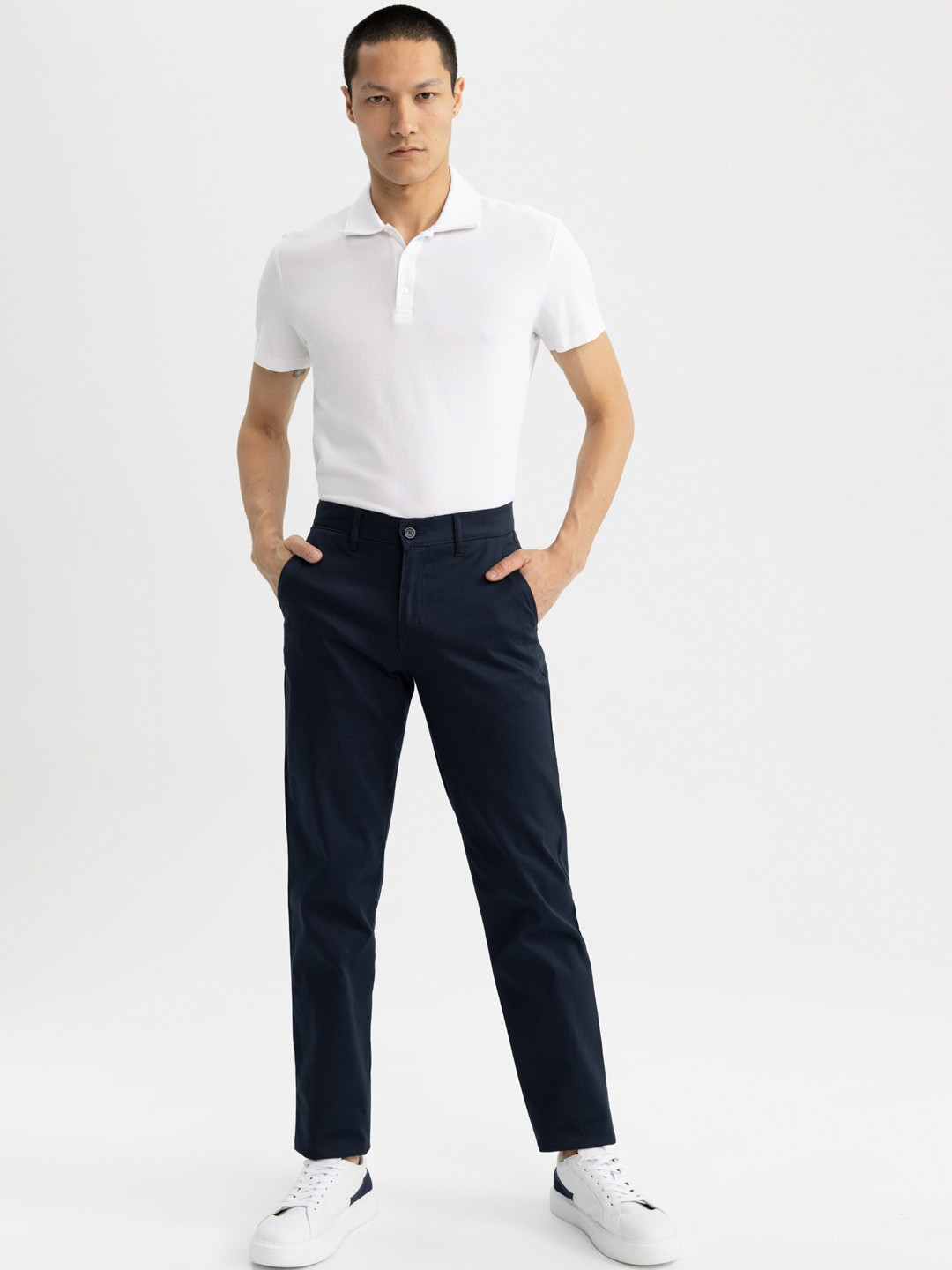 DeFacto Men Cotton Mid-Rise Flat-Front Plain Chinos Trousers, Navy blue 
DeFacto Men Cotton Mid-Rise Flat-Front Plain Chinos Trousers, Navy blue