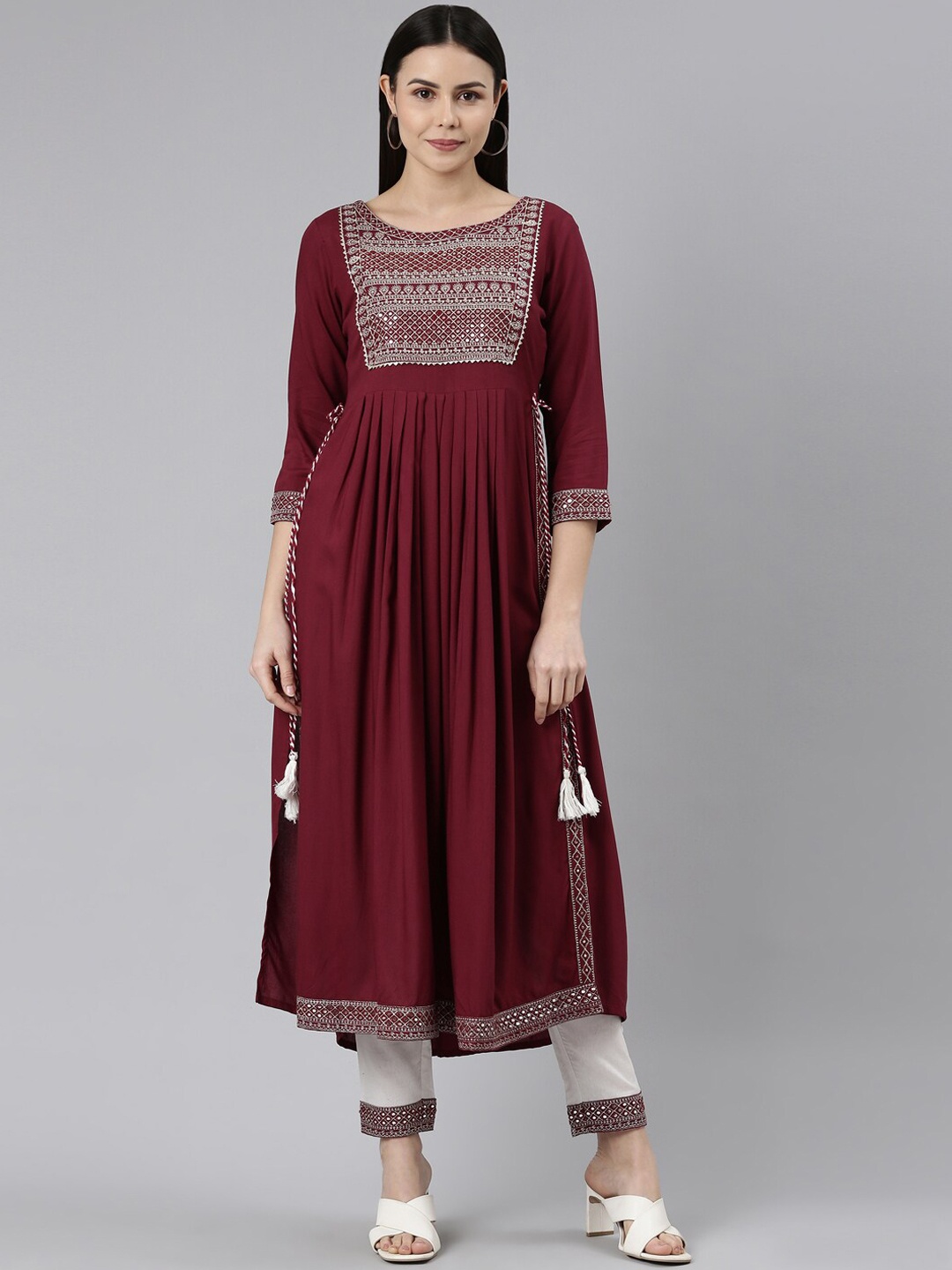 KALINI Ethnic Motifs Embroidered High Slit Mirror Work A-Line Kurta with Trousers, Maroon
KALINI Ethnic Motifs Embroidered High Slit Mirror Work A-Line Kurta with Trousers, Maroon