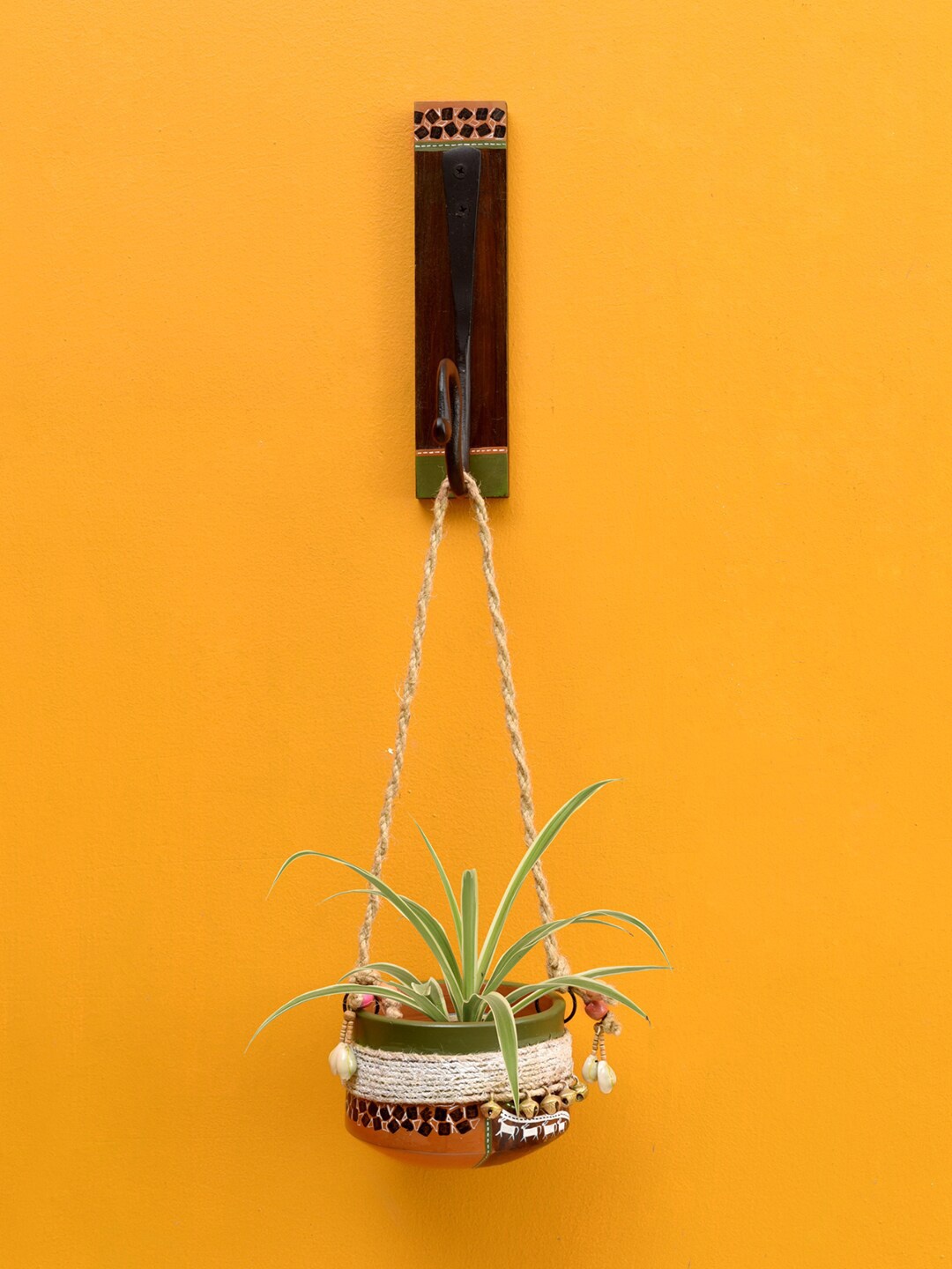 AAKRITI ART CREATIONS Earthen Brown & Green Jute Embellished Terracotta Clay Planter With Wall Hook
AAKRITI ART CREATIONS Earthen Brown & Green Jute Embellished Terracotta Clay Planter With Wall Hook