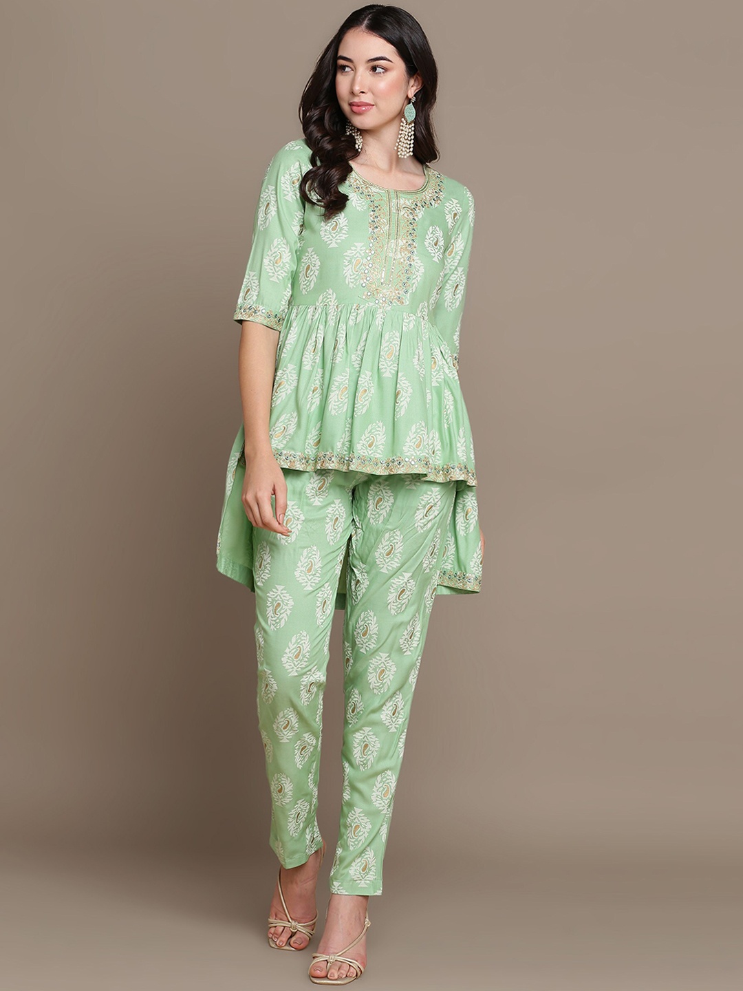 HERE&NOW Ethnic Motifs Embroidered Thread Work Sequinned High-Low Kurti with Trousers, Green
HERE&NOW Ethnic Motifs Embroidered Thread Work Sequinned High-Low Kurti with Trousers, Green