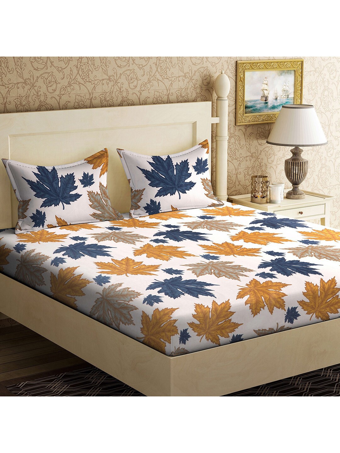 Urban Magic White & Navy Blue Maple Leaf Cotton 104 TC Queen Bedsheet With 2 Pillow Covers
Urban Magic White & Navy Blue Maple Leaf Cotton 104 TC Queen Bedsheet With 2 Pillow Covers