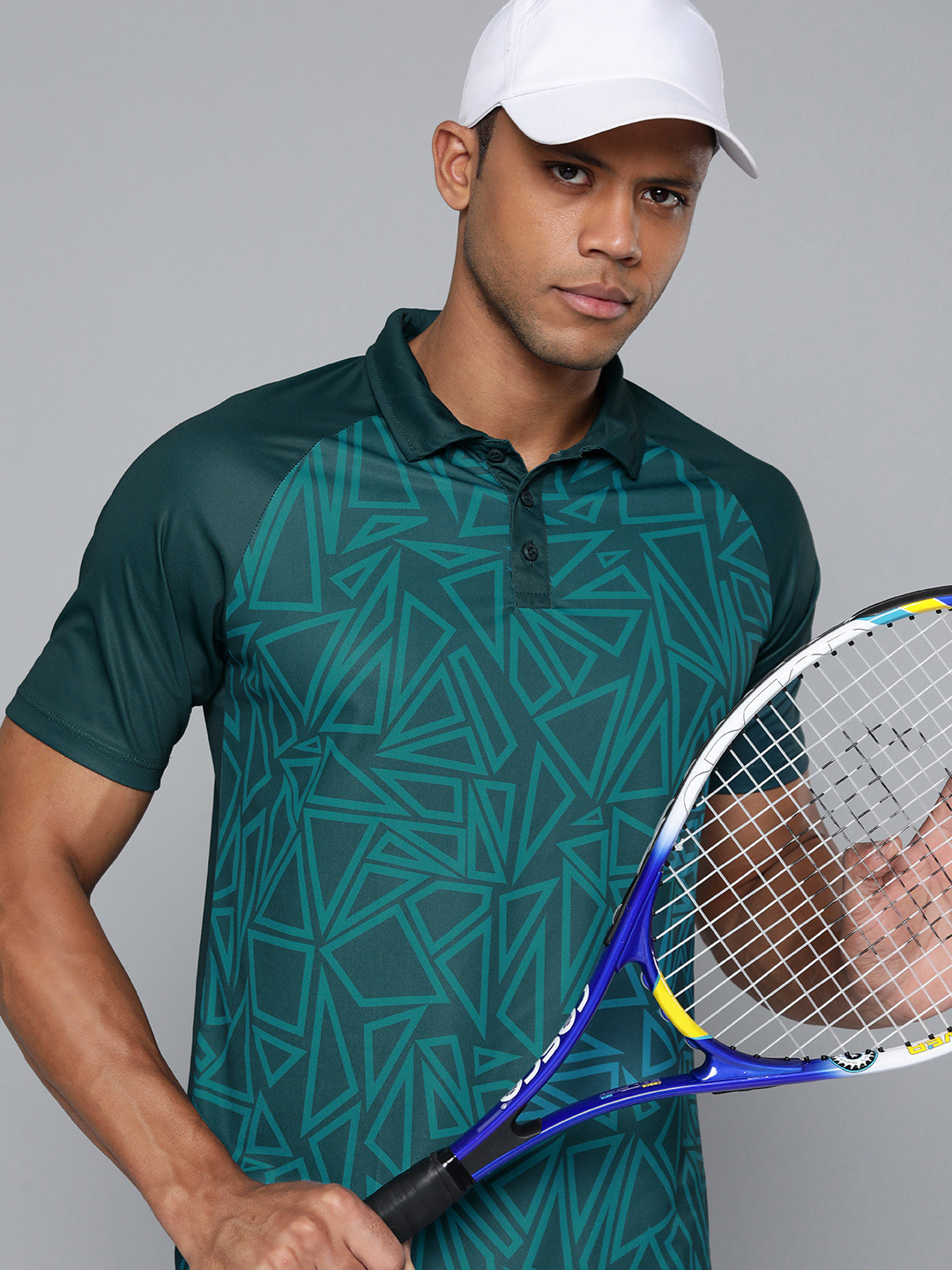 HRX by Hrithik Roshan Men Geometric Printed Polo Collar Rapid-Dry Badminton T-shirt, Teal
HRX by Hrithik Roshan Men Geometric Printed Polo Collar Rapid-Dry Badminton T-shirt, Teal