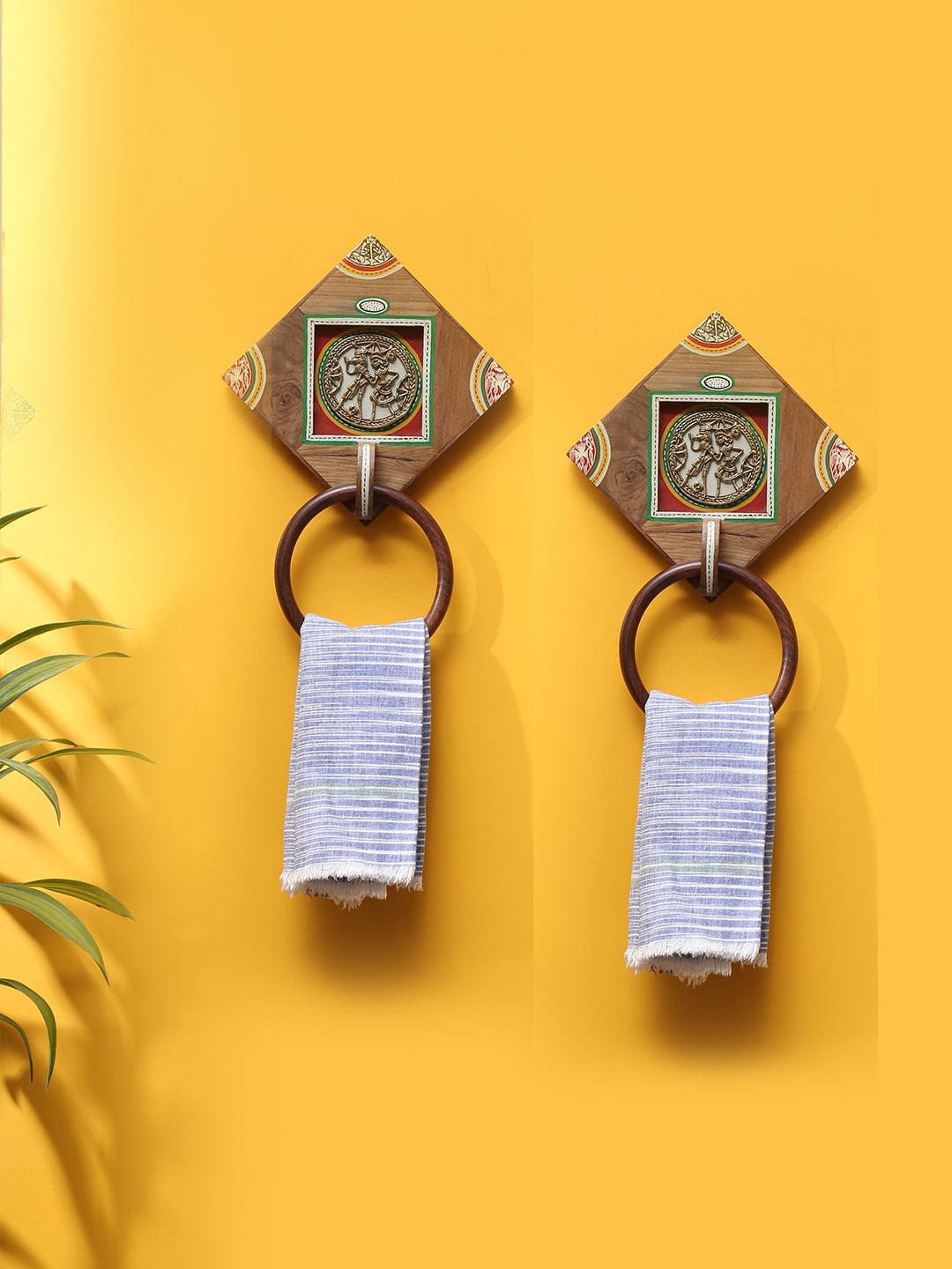 ExclusiveLane Brown & White 2 Pieces Warli Dhokra Design Sheesham Wooden Towel Holders
ExclusiveLane Brown & White 2 Pieces Warli Dhokra Design Sheesham Wooden Towel Holders