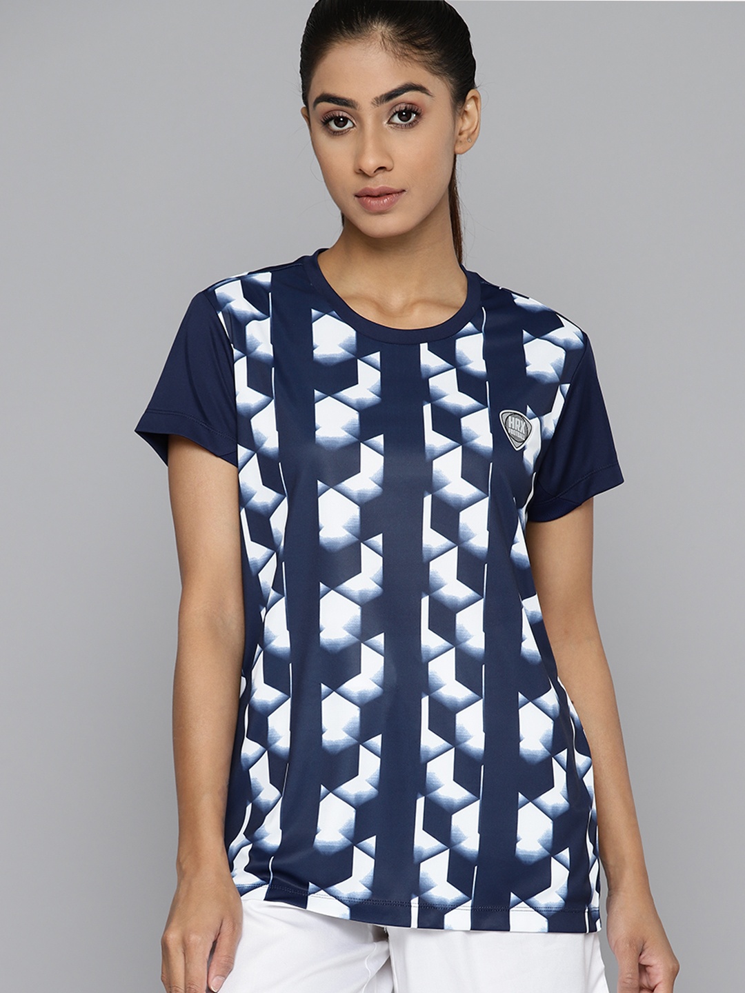HRX by Hrithik Roshan Women Geometric Printed Rapid Dry Sports T-shirt, Navy blue
HRX by Hrithik Roshan Women Geometric Printed Rapid Dry Sports T-shirt, Navy blue