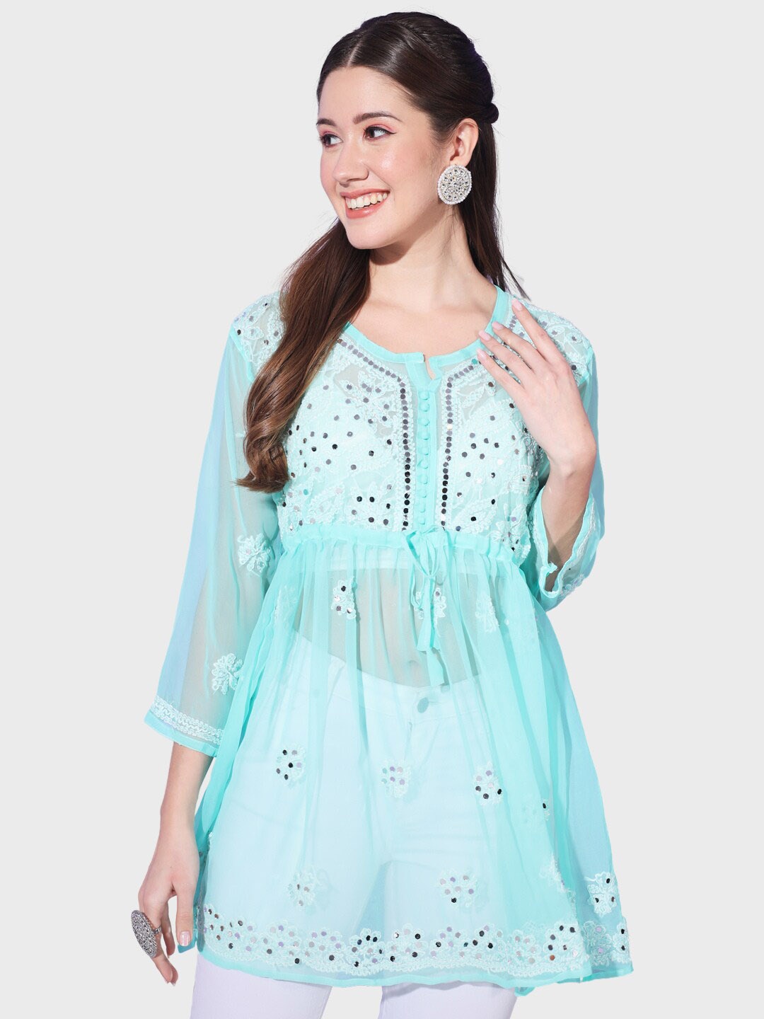 BUY NEW TREND Floral Embroidered Notched Neck Mirror Work A-Line Kurti, Turquoise blue
BUY NEW TREND Floral Embroidered Notched Neck Mirror Work A-Line Kurti, Turquoise blue
