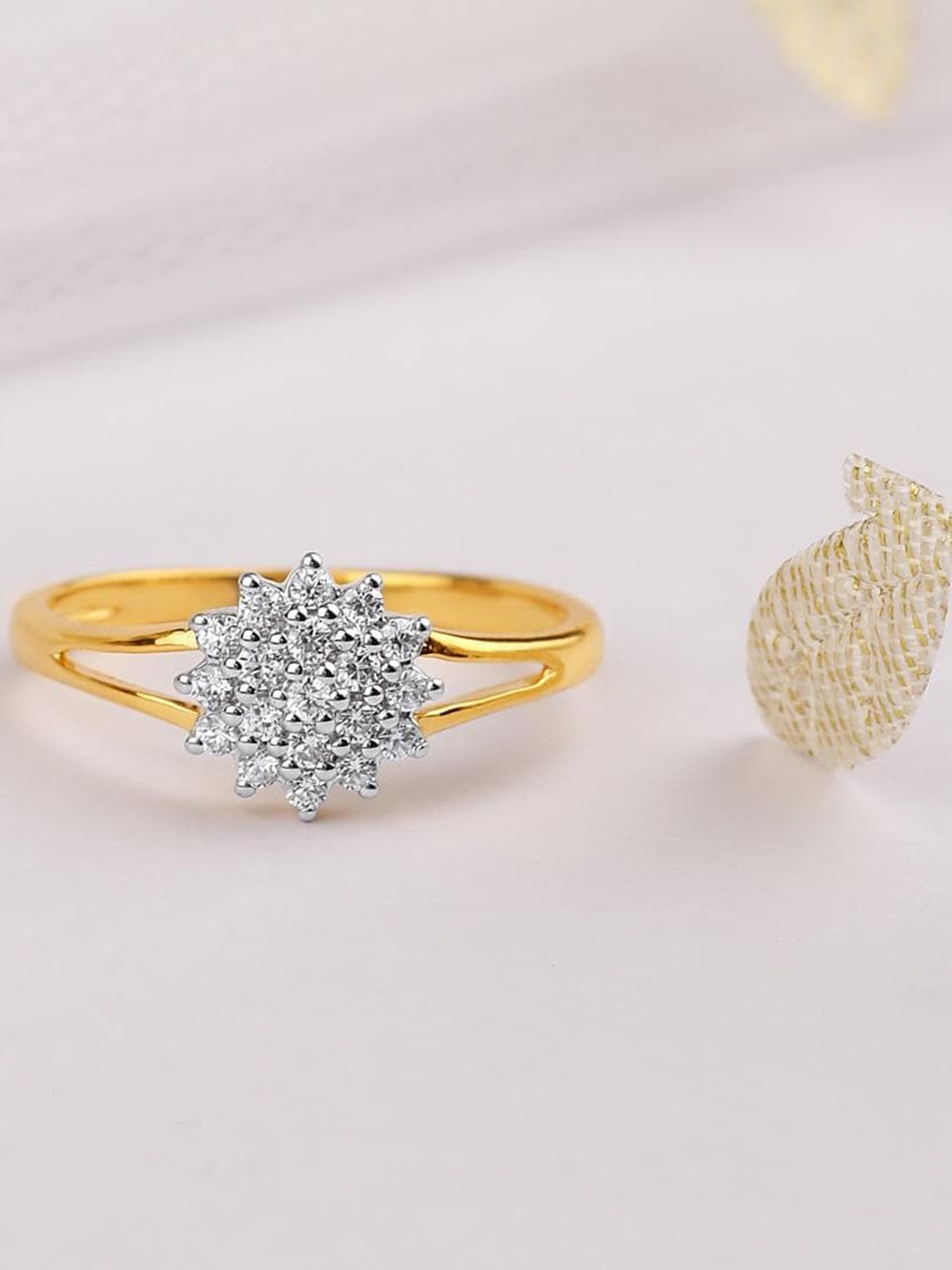 CANDERE A KALYAN JEWELLERS COMPANY Cubic Zirconia Studded 22KT Gold Finger Ring 2.51 g
CANDERE A KALYAN JEWELLERS COMPANY Cubic Zirconia Studded 22KT Gold Finger Ring 2.51 g