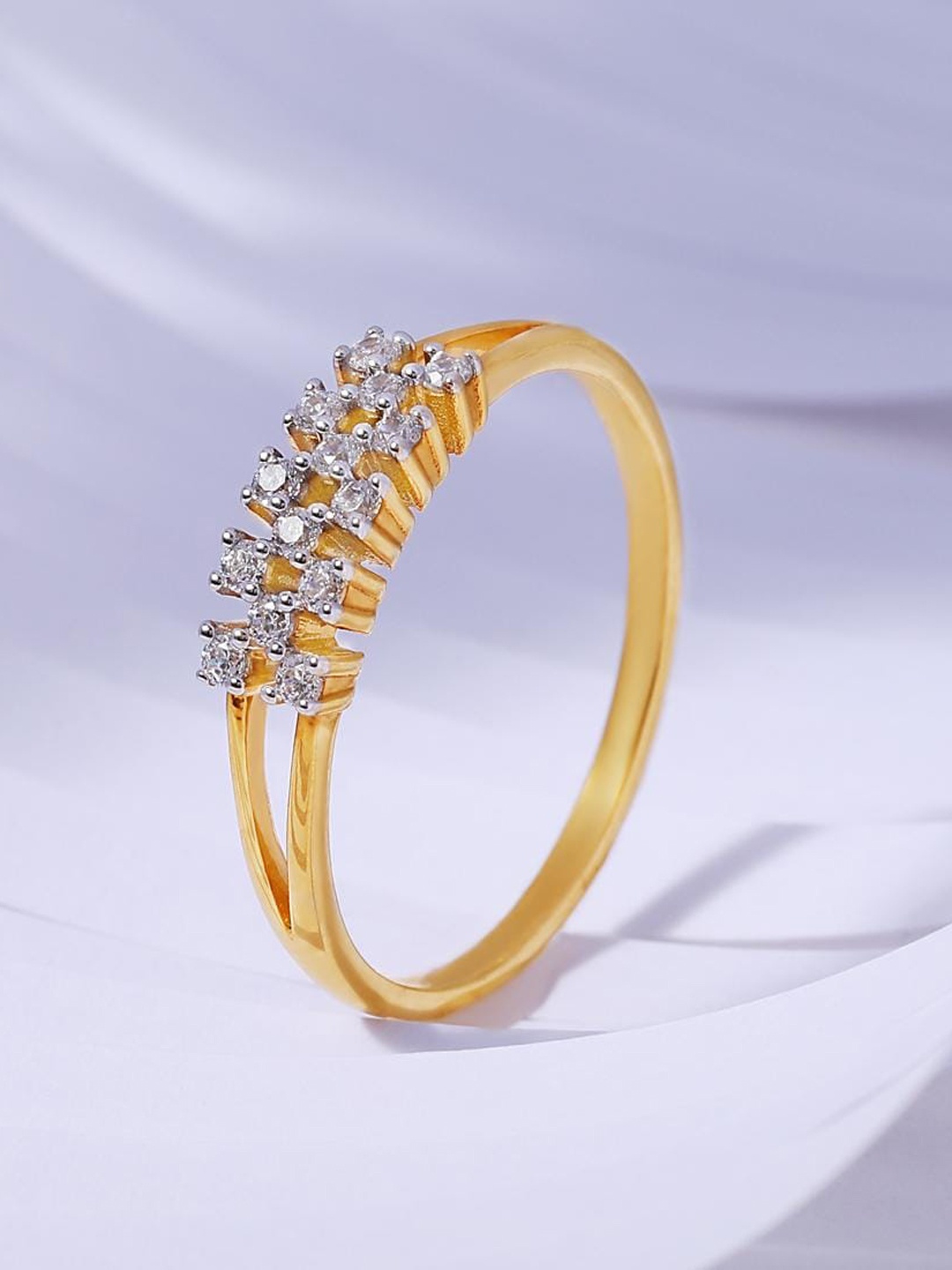 CANDERE A KALYAN JEWELLERS COMPANY Cubic Zirconia Studded 18KT Gold Finger Ring-2.62gm
CANDERE A KALYAN JEWELLERS COMPANY Cubic Zirconia Studded 18KT Gold Finger Ring-2.62gm