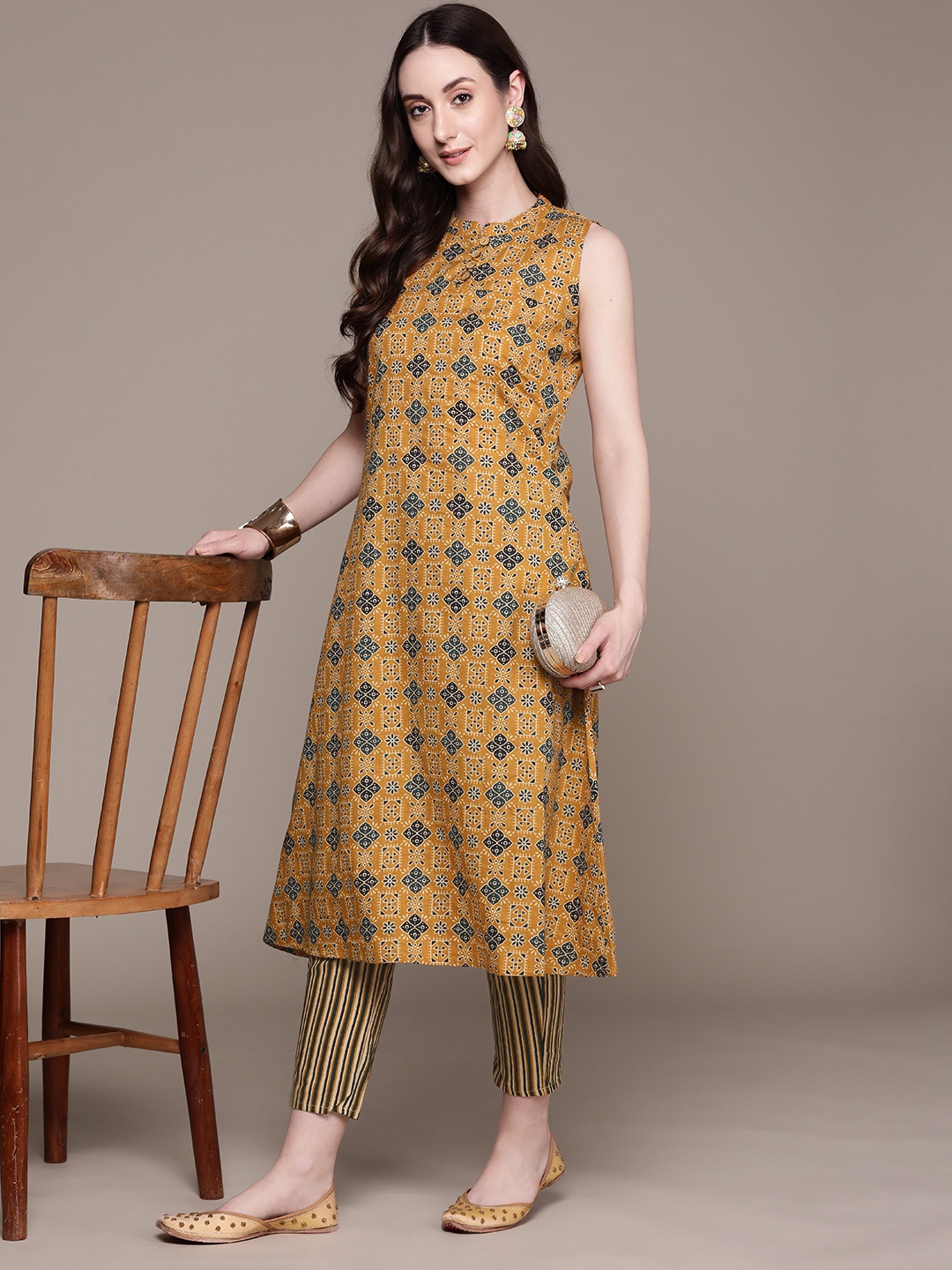 Anubhutee Women Ethnic Motifs Printed Regular Pure Cotton Kurta with Trousers, Mustard
Anubhutee Women Ethnic Motifs Printed Regular Pure Cotton Kurta with Trousers, Mustard