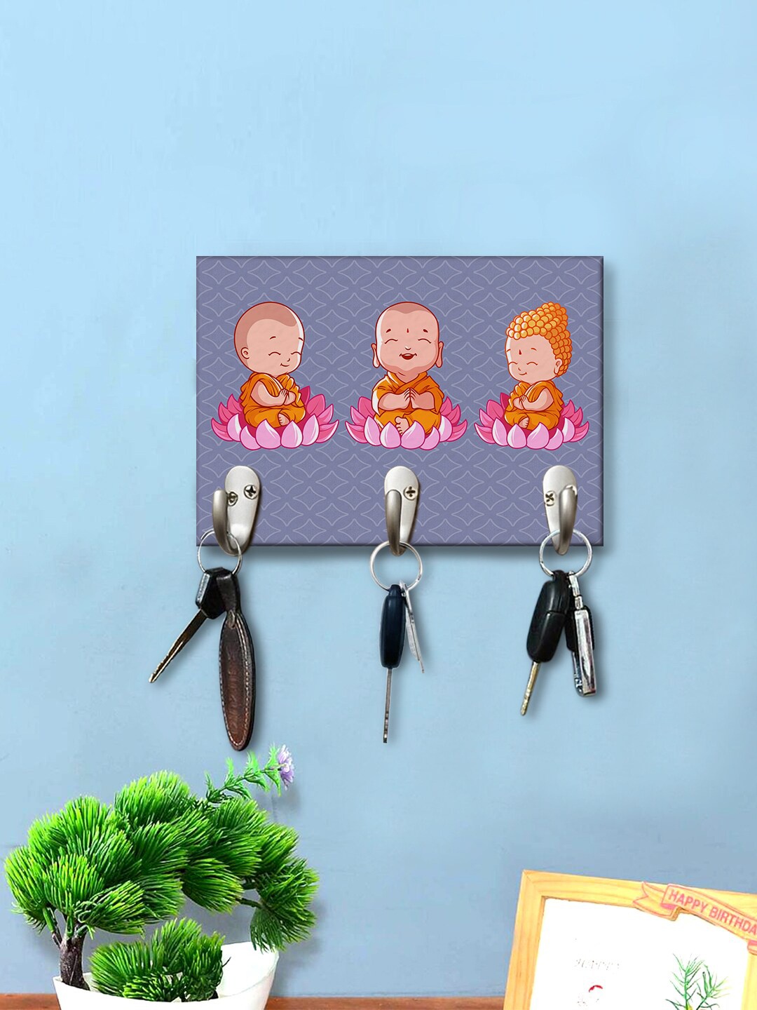 999Store Purple & Orange Baby Buddha Sitting On Lotus Printed Wall Hanging Key Holder
999Store Purple & Orange Baby Buddha Sitting On Lotus Printed Wall Hanging Key Holder