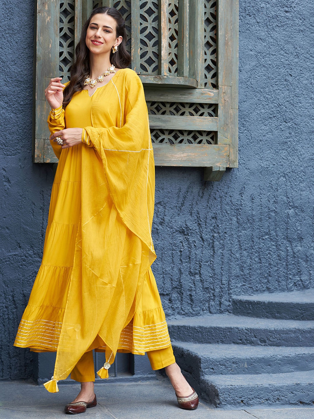 Shae by SASSAFRAS Gotta Patti Tiered Anarkali Kurta with Trousers & With Dupatta, Mustard
Shae by SASSAFRAS Gotta Patti Tiered Anarkali Kurta with Trousers & With Dupatta, Mustard