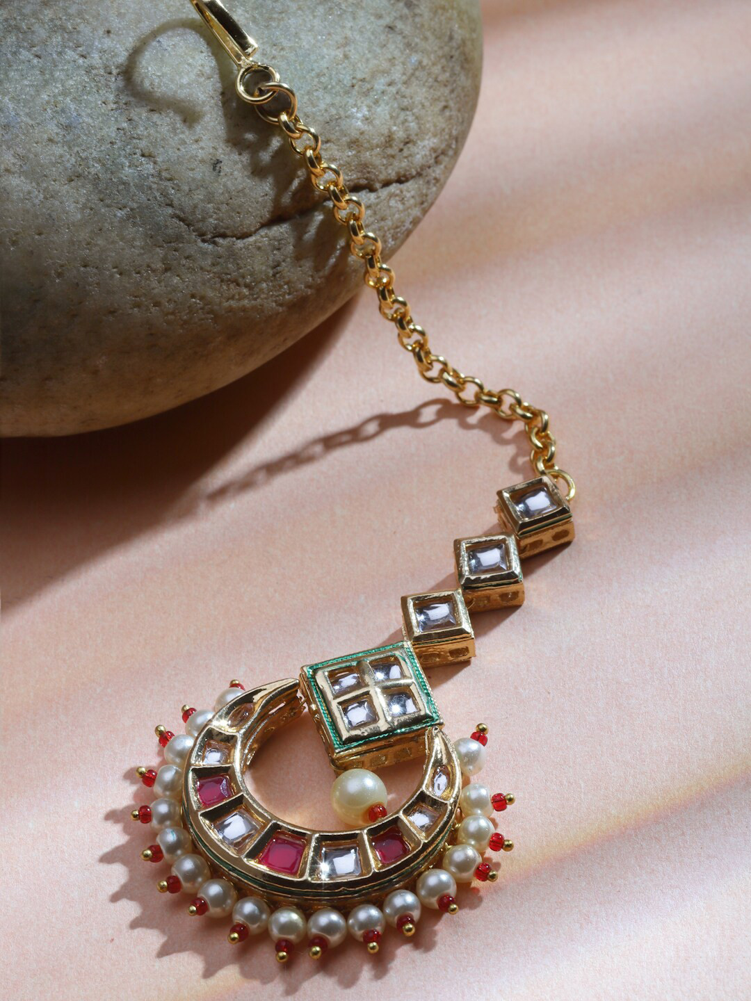 Sanjog Gold-Plated Jadau Kundan Stone-Studded & Pearl Beaded Enameled Maang Tikka
Sanjog Gold-Plated Jadau Kundan Stone-Studded & Pearl Beaded Enameled Maang Tikka