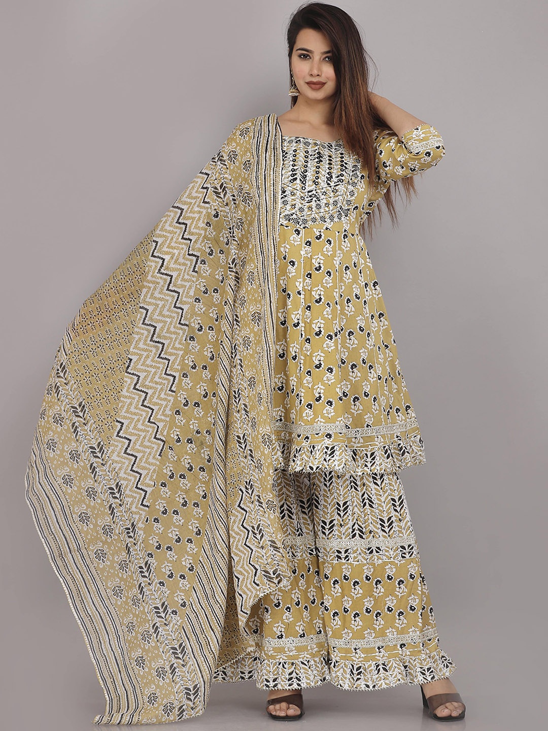 HIGHLIGHT FASHION EXPORT Printed Mirror Work Pure Cotton Kurta with Sharara & Dupatta, Mustard
HIGHLIGHT FASHION EXPORT Printed Mirror Work Pure Cotton Kurta with Sharara & Dupatta, Mustard
