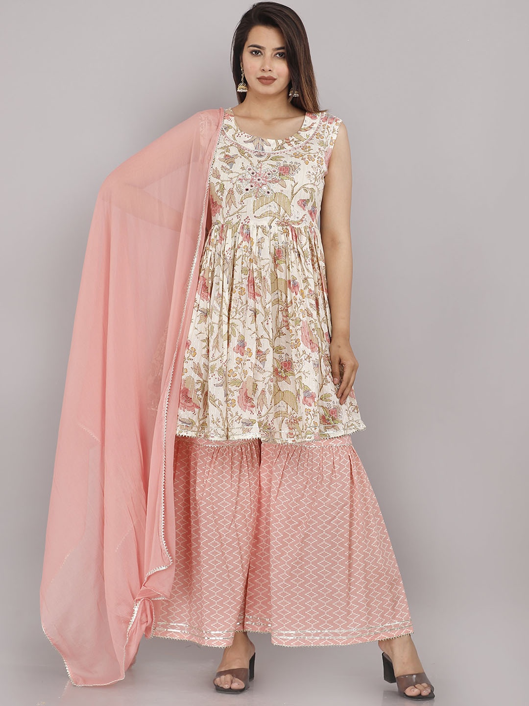 HIGHLIGHT FASHION EXPORT Printed Mirror Work Pure Cotton Kurta with Sharara & Dupatta, Peach
HIGHLIGHT FASHION EXPORT Printed Mirror Work Pure Cotton Kurta with Sharara & Dupatta, Peach