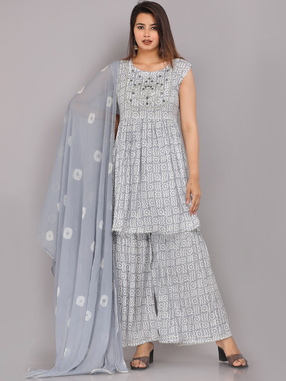 KALINI Ethnic motifs Printed Mirror Work Pure Cotton Kurta with Sharara & Dupatta, Grey
KALINI Ethnic motifs Printed Mirror Work Pure Cotton Kurta with Sharara & Dupatta, Grey