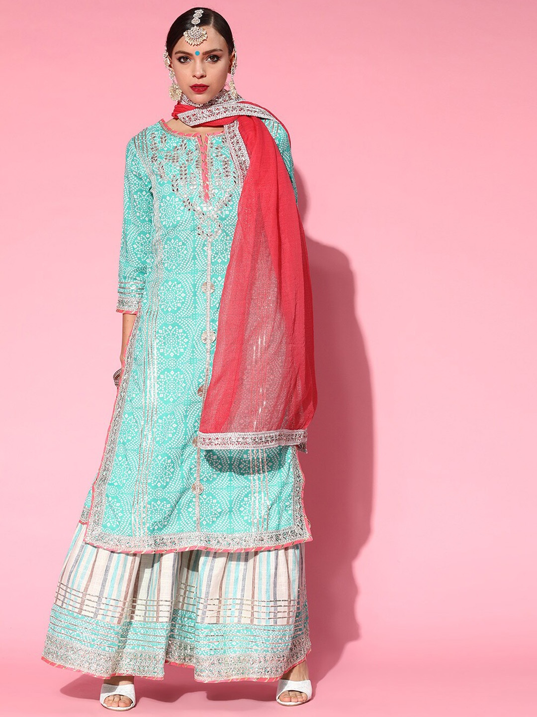 Ishin Turquoise Blue & Red Printed Gotta Patti Pure Cotton Kurta with Sharara & Dupatta
Ishin Turquoise Blue & Red Printed Gotta Patti Pure Cotton Kurta with Sharara & Dupatta
