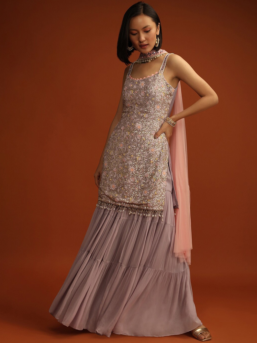 KALKI Fashion Floral Embroidered Sequined Georgette Kurti with Sharara & Dupatta, Mauve
KALKI Fashion Floral Embroidered Sequined Georgette Kurti with Sharara & Dupatta, Mauve