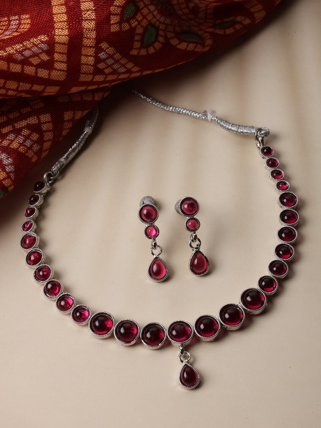 ZENEME Rhodium-Plated Round American Diamond Studded Necklace with Earrings Jewellery Set, Red
ZENEME Rhodium-Plated Round American Diamond Studded Necklace with Earrings Jewellery Set, Red