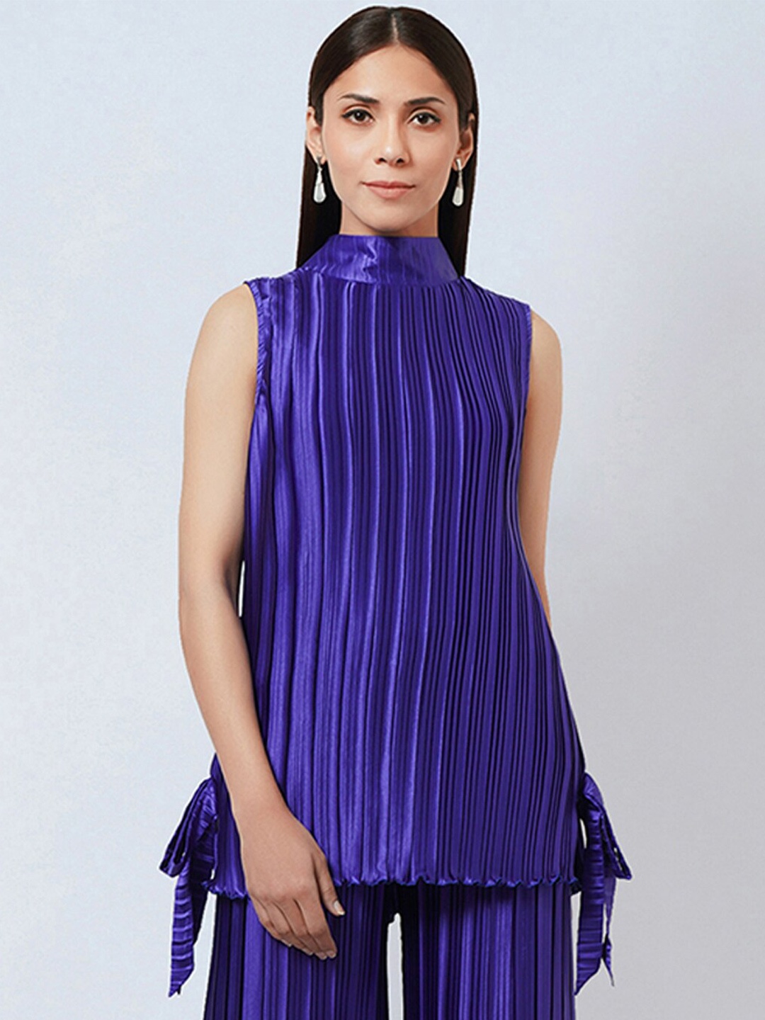 First Resort by Ramola Bachchan Accordion Pleated High Neck Sleeveless Satin Top, Blue
First Resort by Ramola Bachchan Accordion Pleated High Neck Sleeveless Satin Top, Blue