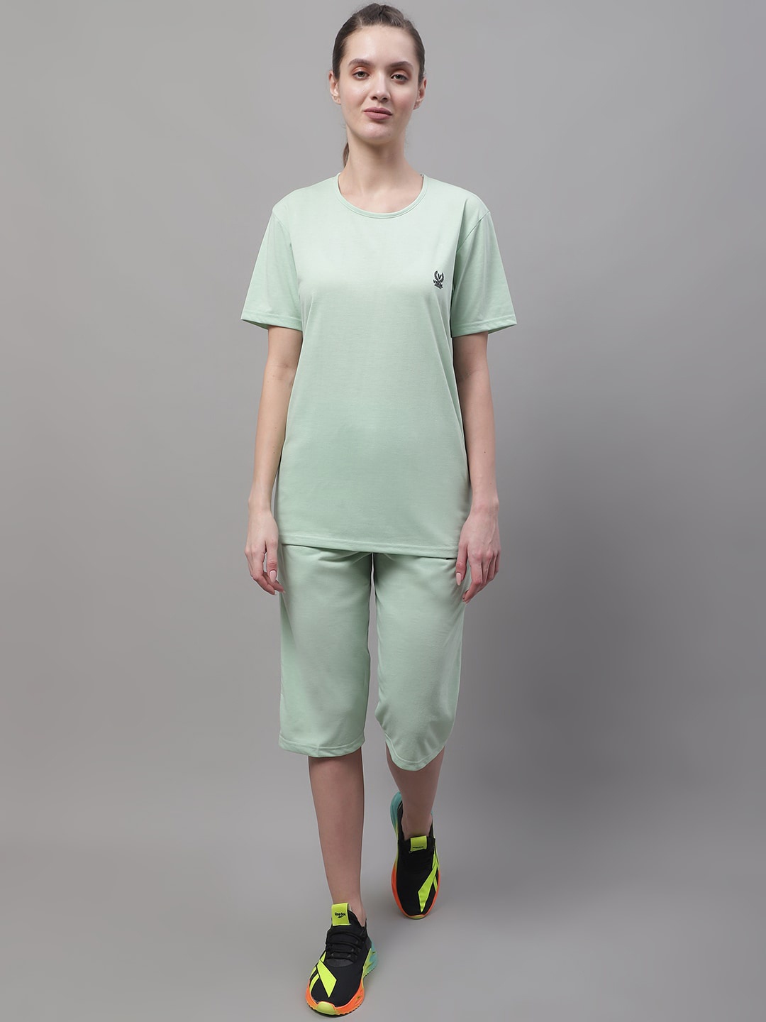 VIMAL JONNEY Round Neck Pure Cotton Short Sleeves Sports T-shirt With Capri Co-Ords, Sea green
VIMAL JONNEY Round Neck Pure Cotton Short Sleeves Sports T-shirt With Capri Co-Ords, Sea green