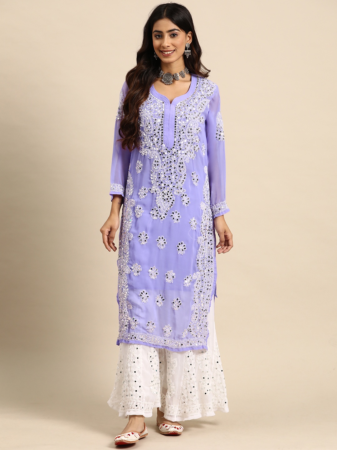 Saadgi Ethnic Motifs Embroidered Sweetheart Neck Chikankari Kurta With Sharara, Violet
Saadgi Ethnic Motifs Embroidered Sweetheart Neck Chikankari Kurta With Sharara, Violet
