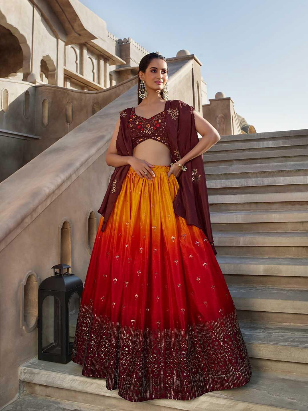 SHUBHKALA Embroidered Mirror Work Semi-Stitched Lehenga & Unstitched Blouse With Dupatta, Orange
SHUBHKALA Embroidered Mirror Work Semi-Stitched Lehenga & Unstitched Blouse With Dupatta, Orange