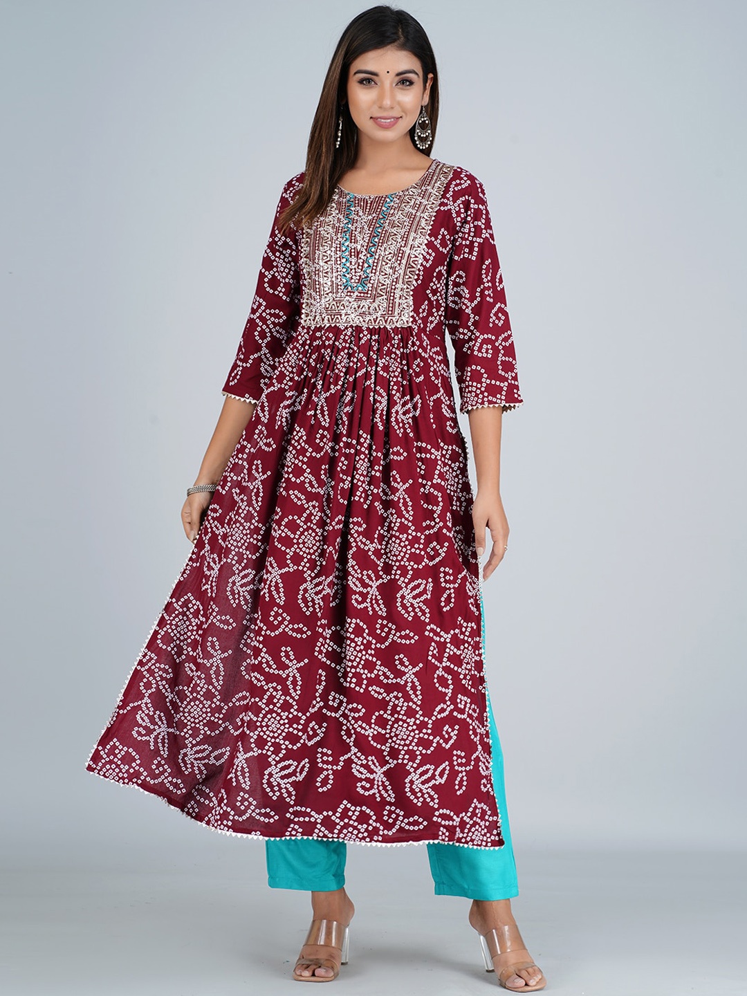 Bachuu Bandhani Printed Thread Work Pleated High Slit Kurta with Trousers, Maroon
Bachuu Bandhani Printed Thread Work Pleated High Slit Kurta with Trousers, Maroon