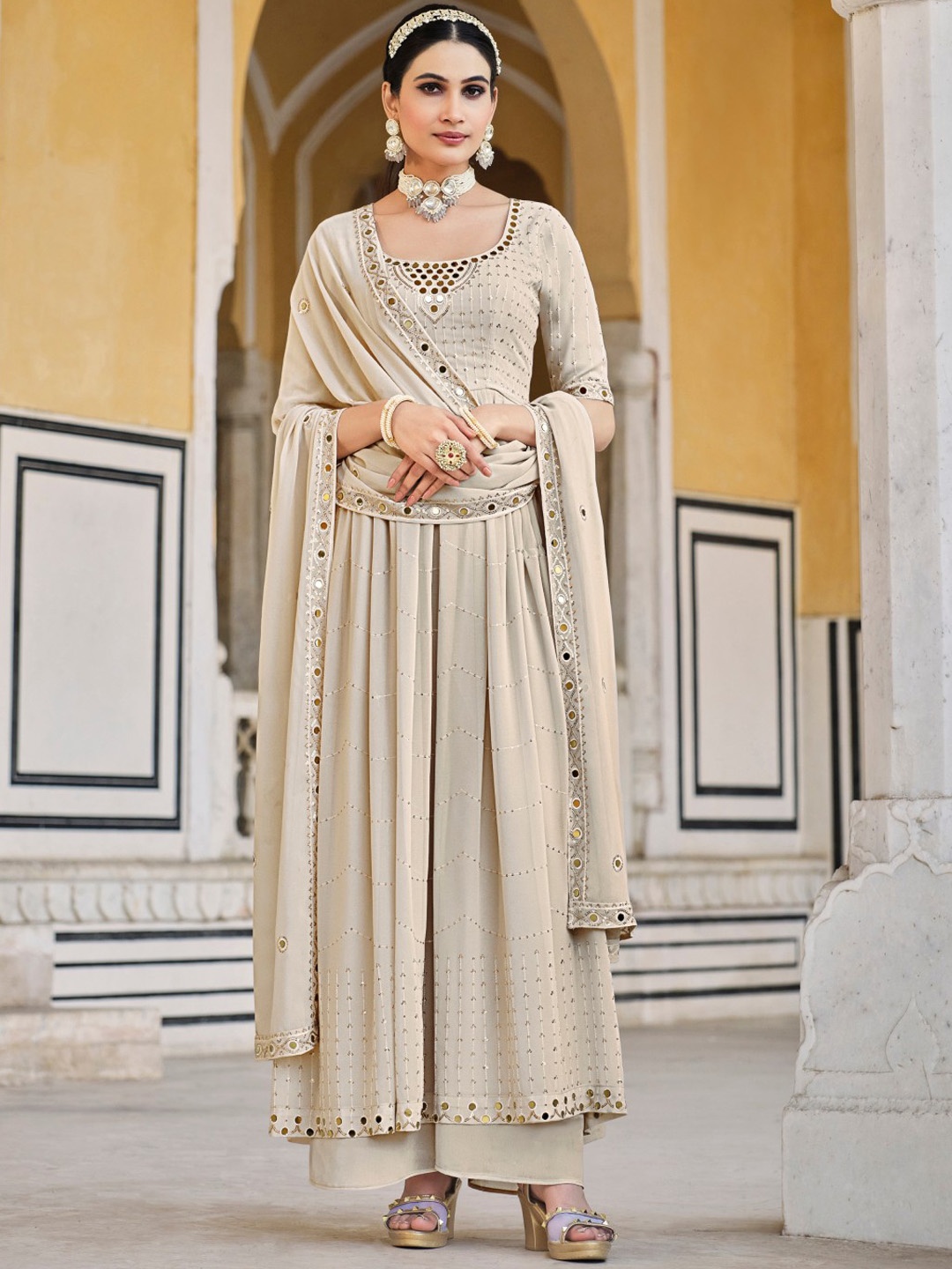 SHUBHKALA Women Beige Ethnic Motifs Embroidered Regular Kurta with Palazzos & With Dupatta
SHUBHKALA Women Beige Ethnic Motifs Embroidered Regular Kurta with Palazzos & With Dupatta