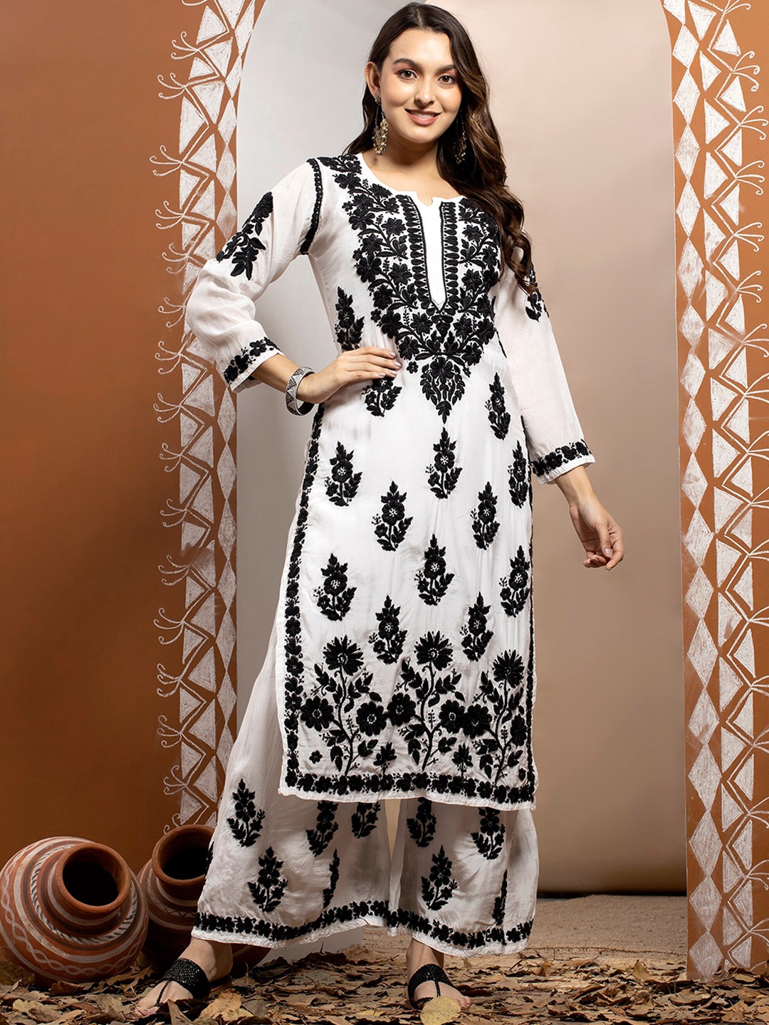 PARAMOUNT CHIKAN Women White & Black Floral Embroidered Chikankari Kurta with Palazzo
PARAMOUNT CHIKAN Women White & Black Floral Embroidered Chikankari Kurta with Palazzo