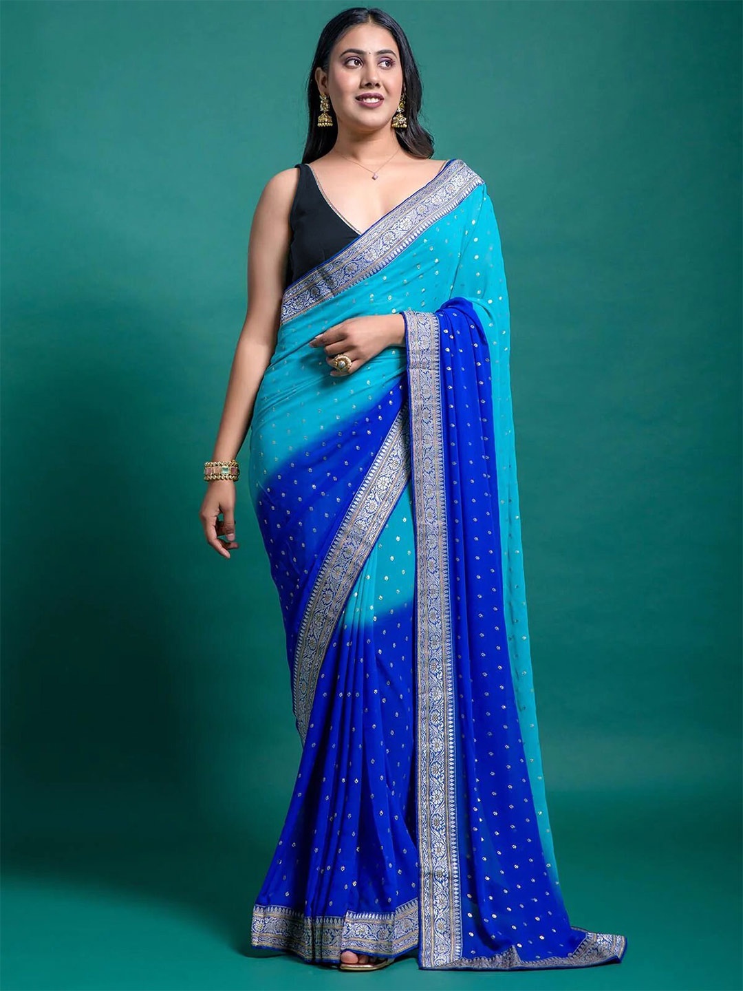 Mitera Blue & Gold-Toned Ethnic Motifs Pure Georgette Half and Half Block Print Saree
Mitera Blue & Gold-Toned Ethnic Motifs Pure Georgette Half and Half Block Print Saree
