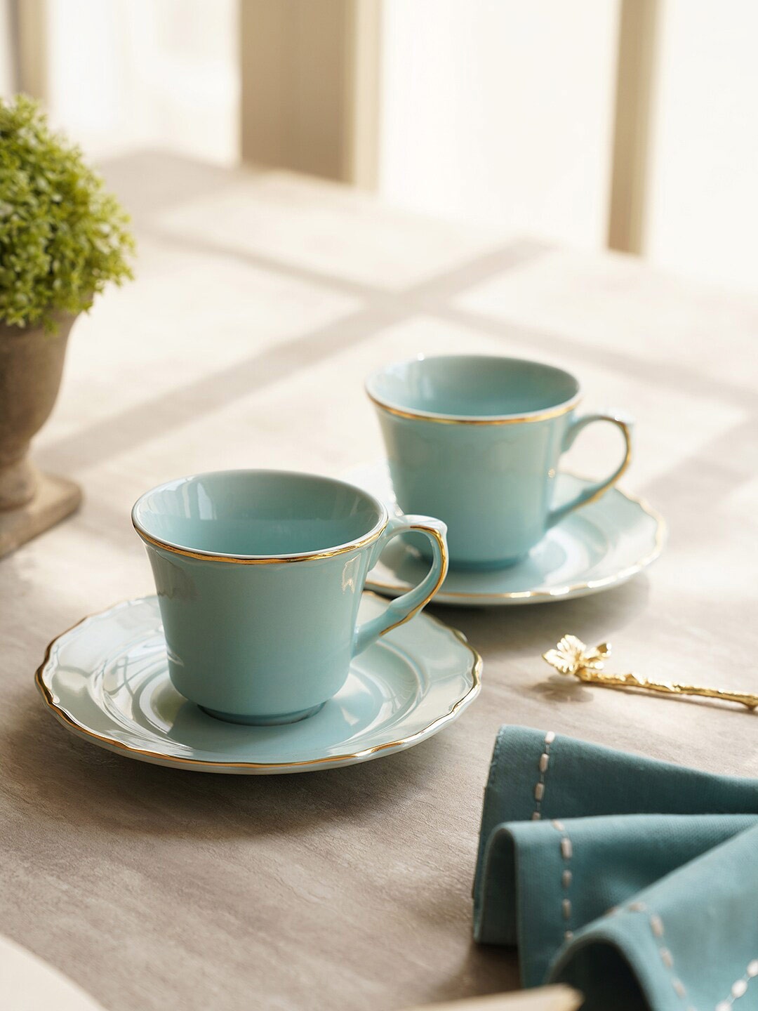Pure Home and Living Blue & Gold-Toned 2Pcs Porcelain Glossy Cups and Saucers 330 ml Each
Pure Home and Living Blue & Gold-Toned 2Pcs Porcelain Glossy Cups and Saucers 330 ml Each