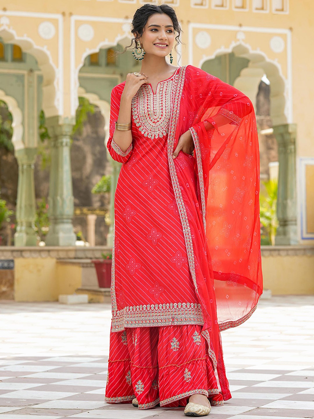 SCAKHI Leheriya Printed Thread Work Regular Kurta with Sharara & With Dupatta, Red
SCAKHI Leheriya Printed Thread Work Regular Kurta with Sharara & With Dupatta, Red