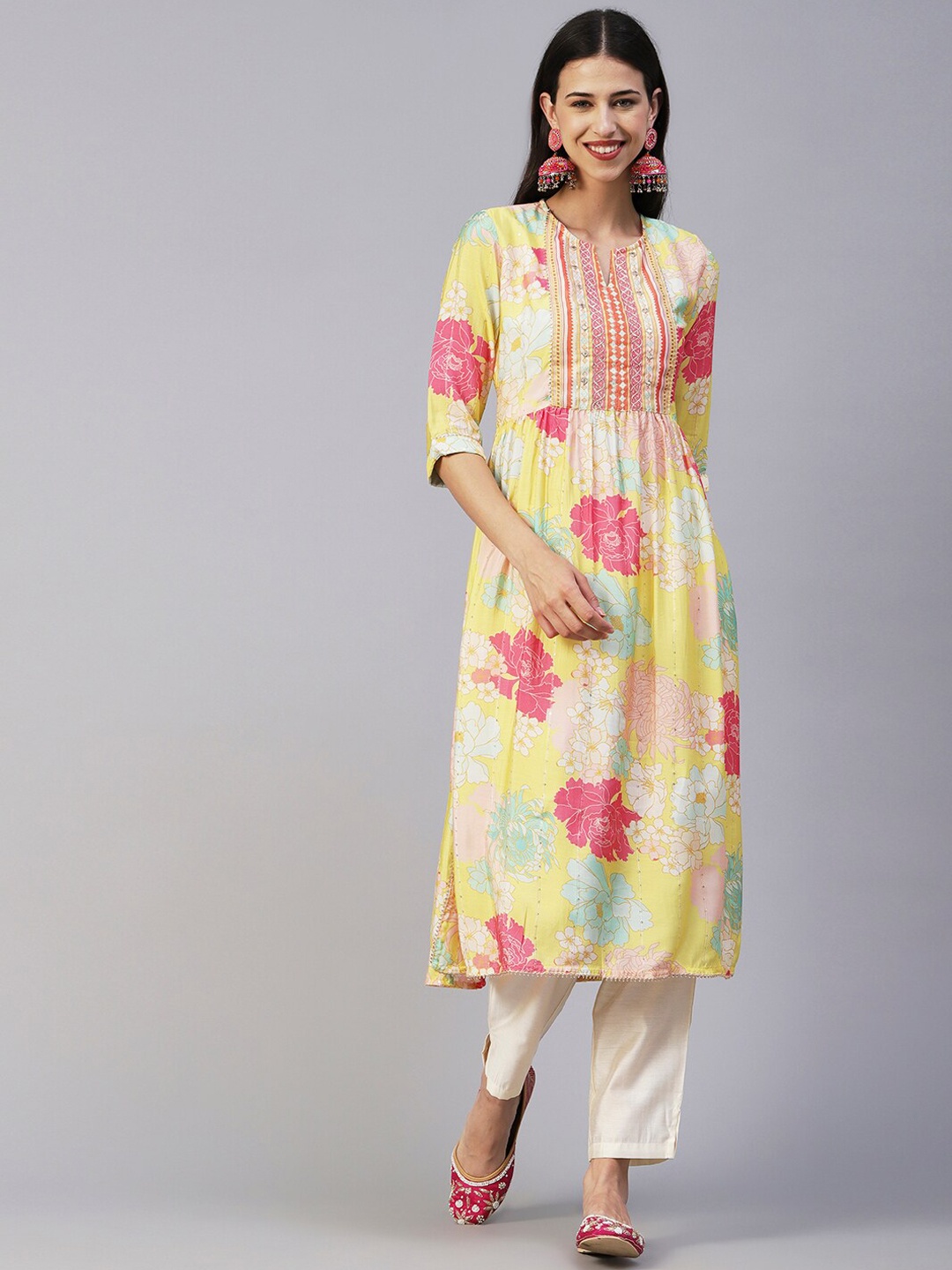 FASHOR Yellow & Off White Floral Printed Pleated Mirror Work Sequined Kurta with Trousers
FASHOR Yellow & Off White Floral Printed Pleated Mirror Work Sequined Kurta with Trousers