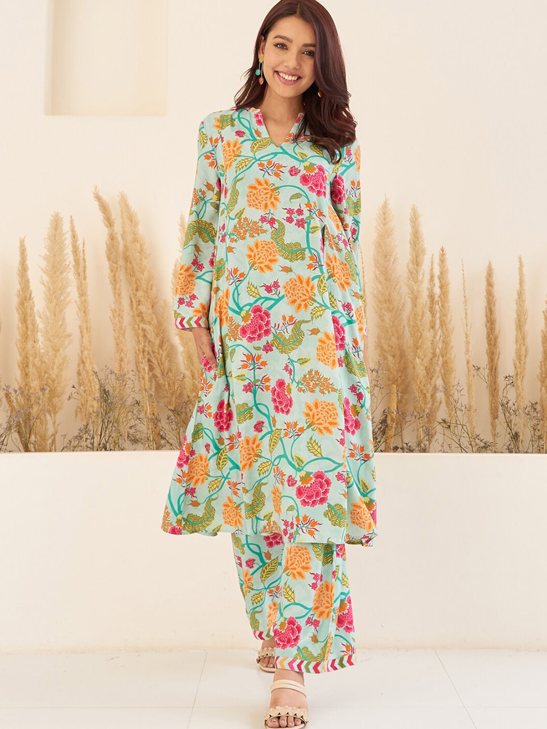Rustorange Floral Printed Mandarin Collar A-Line Kurta With Palazzos, Sea green
Rustorange Floral Printed Mandarin Collar A-Line Kurta With Palazzos, Sea green