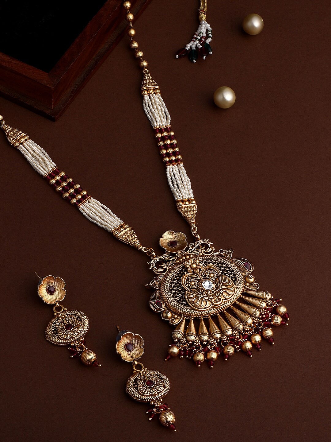 ASMITTA JEWELLERY Gold-Plated Stone-Studded & Beaded Long Necklace and Earrings
ASMITTA JEWELLERY Gold-Plated Stone-Studded & Beaded Long Necklace and Earrings
