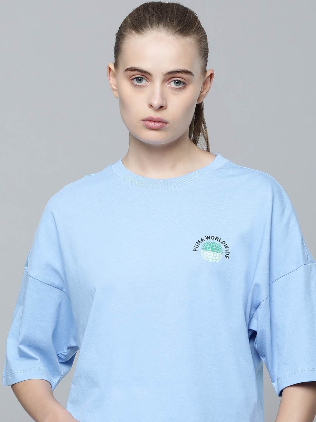 Puma Women Drop-Shoulder Sleeves Pure Cotton Oversized Worldwide Graphic WoUnisex T-shirt, Blue
Puma Women Drop-Shoulder Sleeves Pure Cotton Oversized Worldwide Graphic WoUnisex T-shirt, Blue