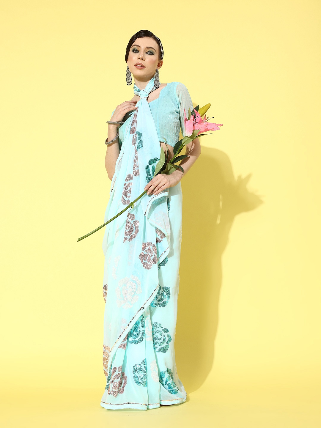 Mitera Turquoise Blue & Rust Floral Sequinned Pure Georgette Saree