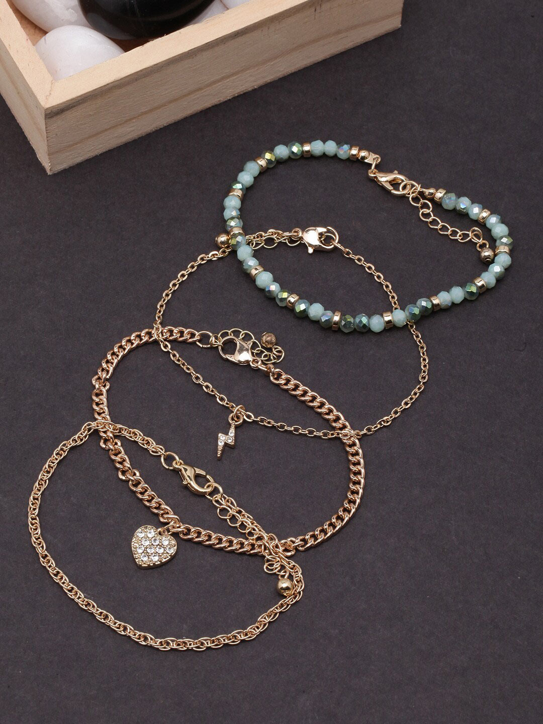 DIVA WALK Set Of 4 Gold-Plated Beaded Charm Bracelets
DIVA WALK Set Of 4 Gold-Plated Beaded Charm Bracelets