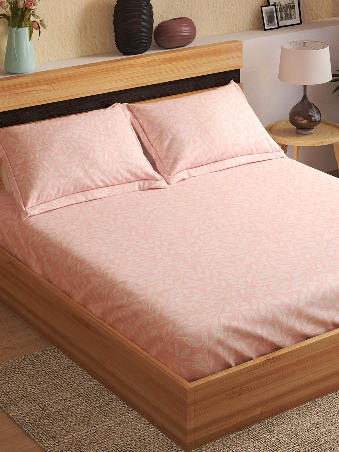 Home Centre Peach-Coloured Floral 144 TC Fitted Cotton Queen Bedsheet with 2 Pillow Covers
Home Centre Peach-Coloured Floral 144 TC Fitted Cotton Queen Bedsheet with 2 Pillow Covers