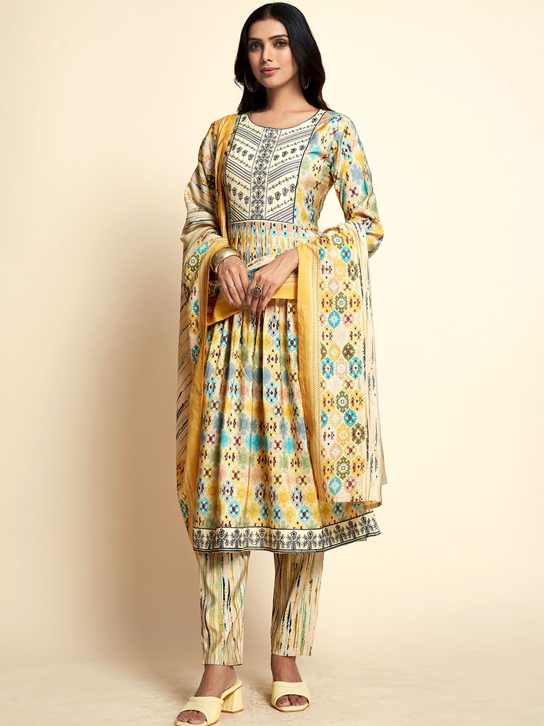 Ishin Beige Ethnic Motifs Printed Pleated Thread Work Kurta with Trousers & With Dupatta
Ishin Beige Ethnic Motifs Printed Pleated Thread Work Kurta with Trousers & With Dupatta