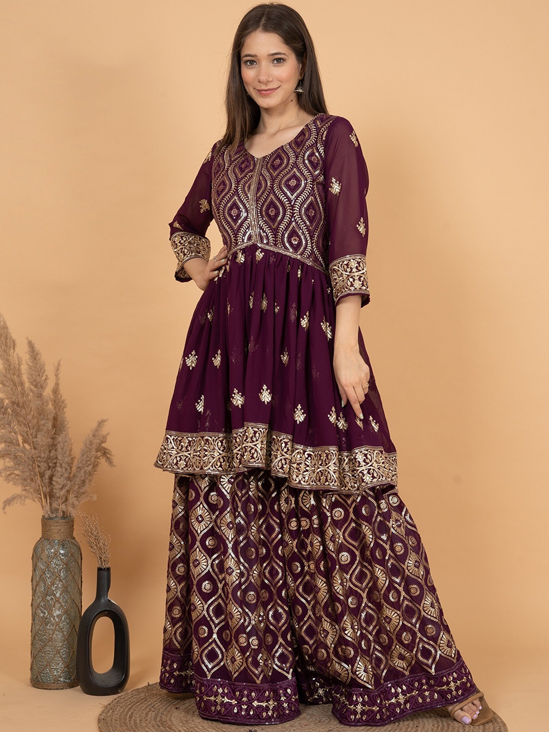 Sitaram Designer Ethnic Motifs Embroidered Sequined Gotta Patti A-Line Kurti with Sharara, Magenta
Sitaram Designer Ethnic Motifs Embroidered Sequined Gotta Patti A-Line Kurti with Sharara, Magenta