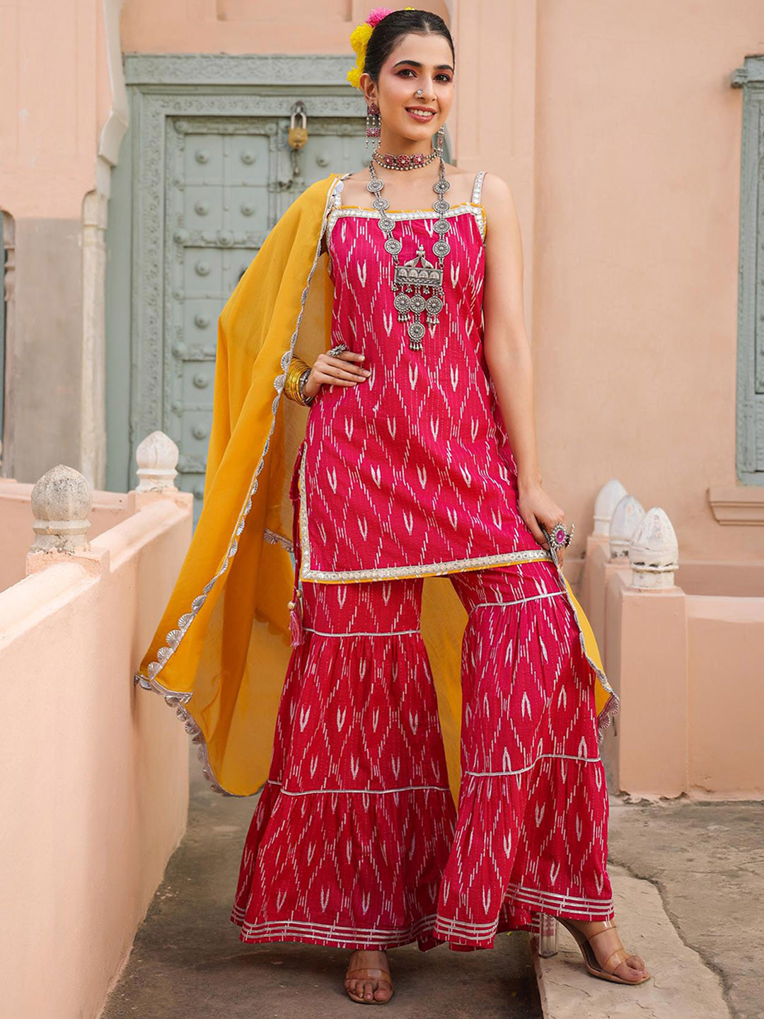 SCAKHI Printed Ikat Shoulder Straps Gotta Patti Kurti With Sharara & Dupatta, Pink
SCAKHI Printed Ikat Shoulder Straps Gotta Patti Kurti With Sharara & Dupatta, Pink